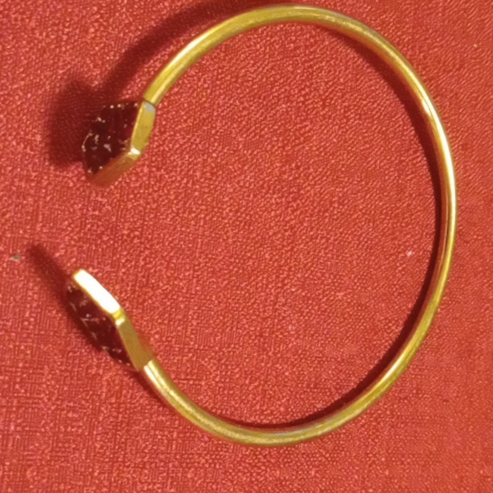 Open gold and ruby bracelet